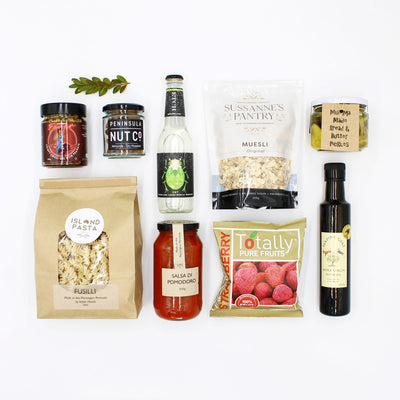 Mumma Made Bread & Butter Pickles and Peninsula Nut Co Dry Roasted Almonds  Island Pasta Fusilli Pasta and Salsa Di Pomodoro combo.  Leaping Goat bring  Extra Virgin Olive Oil with Chilli & Nut Fever Crispy Chilli Oil.  Etch Sparkling Lemon Myrtle, Totally Pure Snap Strawberries and Sussanne’s Pantry Baked Muesli  local vegan gift box options, by Wombat Vegan Café!